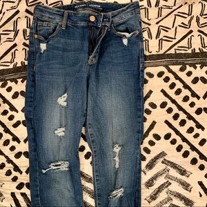 Mid-Rise Distressed Rockstar Super Skinny Jeans